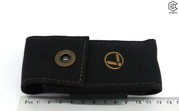 LEATHERMAN®: Nylon Sheath Holster, Black Bronze Stitching, Größe L Vorderansicht mit Lineal